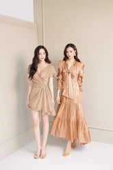 Tiered long sleeve silk midi dress with neck tie detail and gathered cuffs for formal occasions